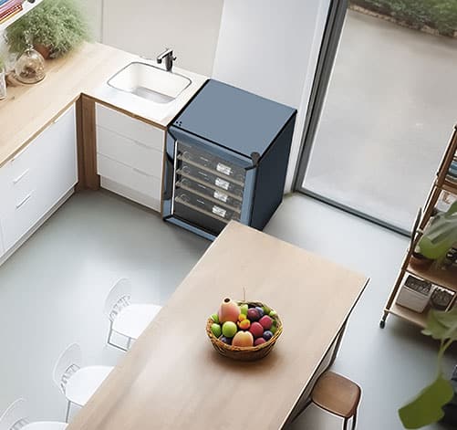 Une cuisine / salle à manger en bois vue du dessus.